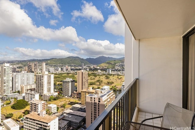 balcony featuring a mountain view