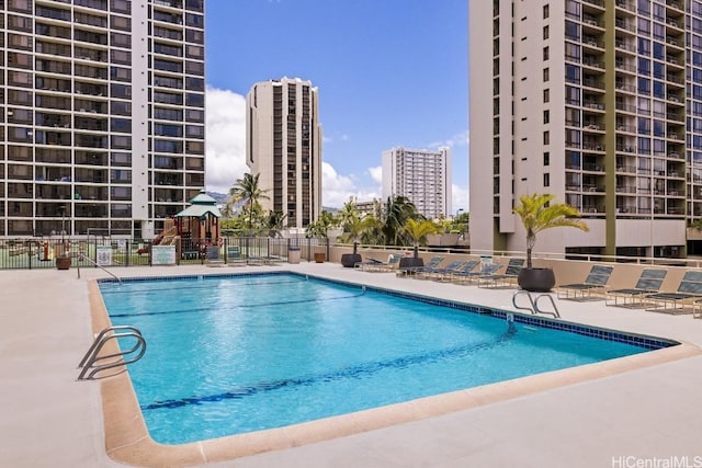 view of swimming pool featuring a patio area