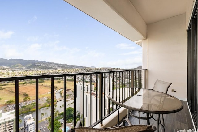 balcony featuring a mountain view