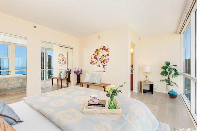 bedroom with light wood-type flooring