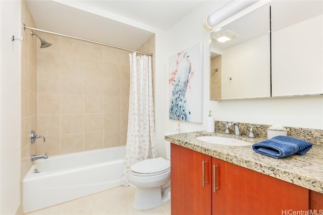 full bathroom with tile patterned floors, vanity, toilet, and shower / bath combo