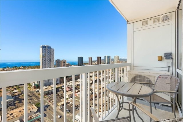 balcony featuring a water view