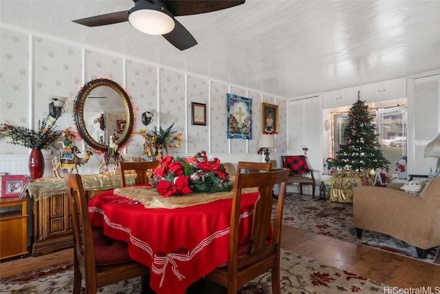 dining room featuring ceiling fan and wood-type flooring