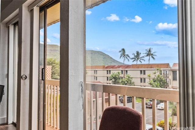 balcony featuring a mountain view