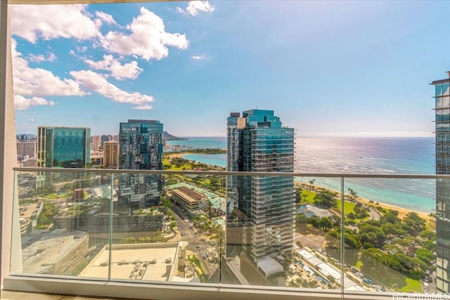 balcony featuring a water view