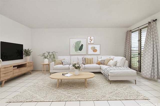 living room with light tile patterned flooring