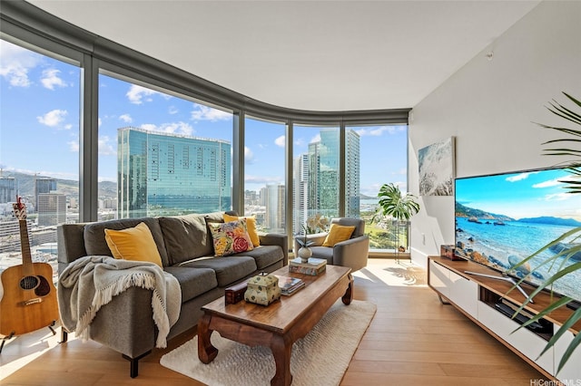 1108 Auahi St Unit 2208, Honolulu, HI 96814 - living area featuring hardwood / wood-style floors and expansive windows