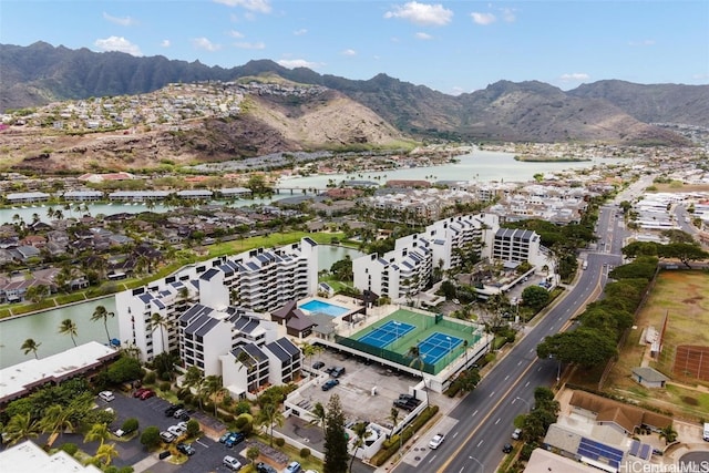 aerial view featuring a water and mountain view