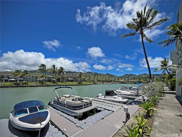 dock area featuring a water and mountain view