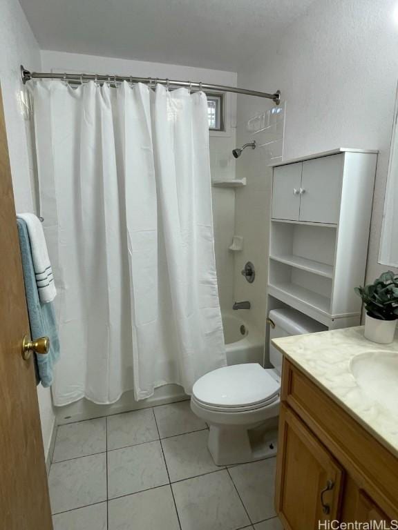 full bathroom with shower / bath combo with shower curtain, tile patterned floors, toilet, and vanity