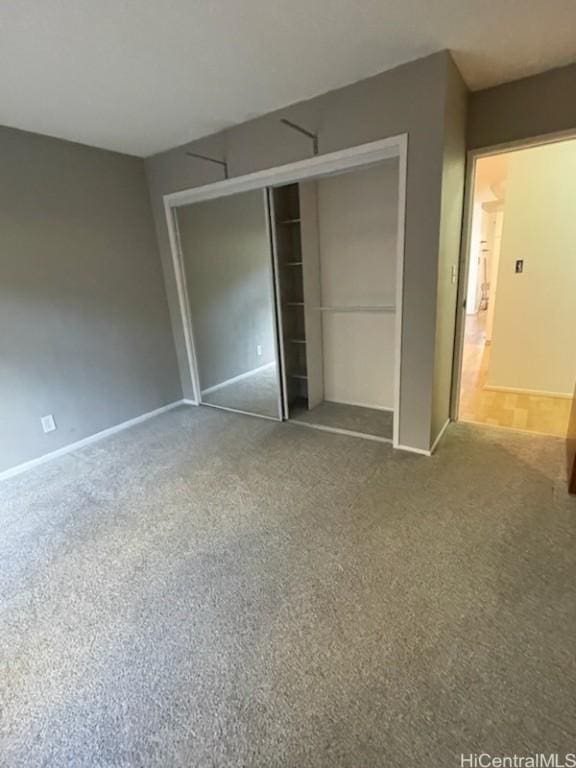 unfurnished bedroom with a closet