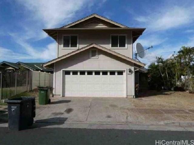 front of property featuring a garage