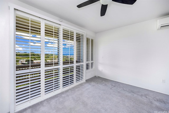 1317 Moanalualani Way Unit 13C, Honolulu, HI 96819 - carpeted spare room with an AC wall unit and a ceiling fan