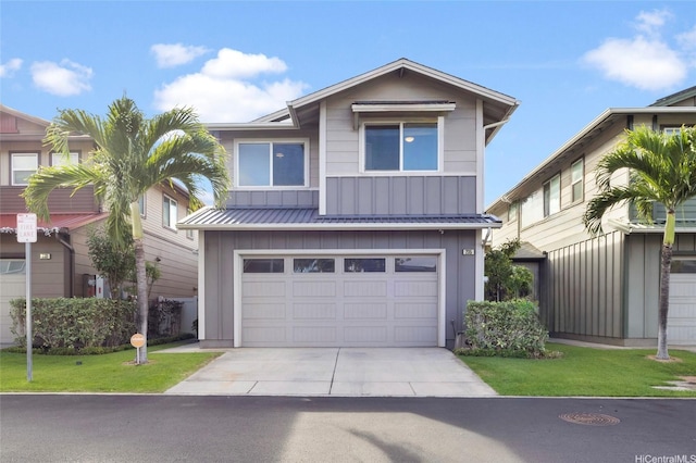 91-6221 Kapolei Pkwy Unit 235, Ewa Beach, HI 96706 - view of front of house with board and batten siding, driveway, a garage, a metal roof, and a standing seam roof