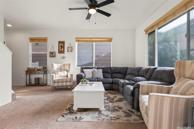 91-6221 Kapolei Pkwy Unit 235, Ewa Beach, HI 96706 - living area featuring light colored carpet and a ceiling fan