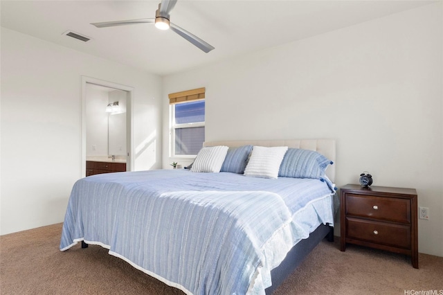 91-6221 Kapolei Pkwy Unit 235, Ewa Beach, HI 96706 - carpeted bedroom with ensuite bath and a ceiling fan