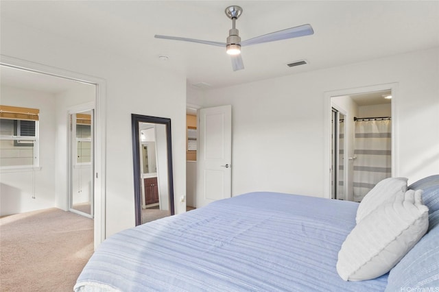 91-6221 Kapolei Pkwy Unit 235, Ewa Beach, HI 96706 - carpeted bedroom featuring connected bathroom and ceiling fan