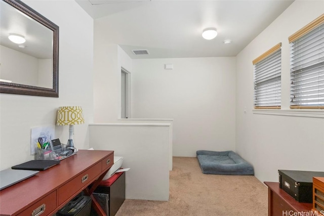 home office featuring light colored carpet