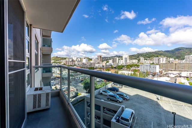 balcony featuring a mountain view