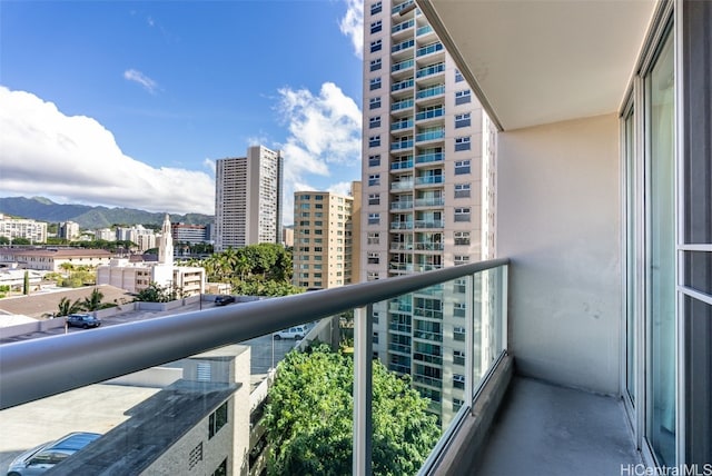 balcony featuring a mountain view