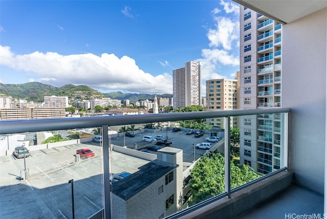 balcony featuring a mountain view