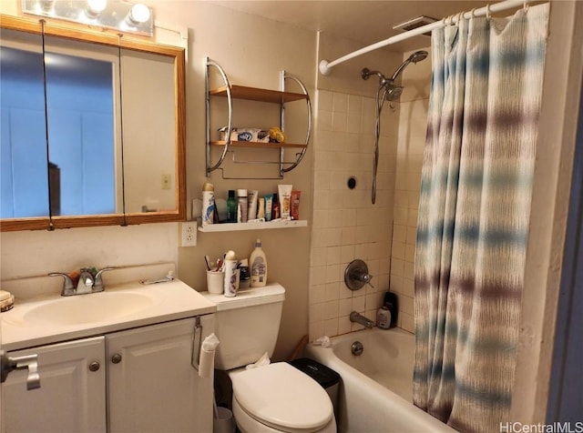 full bathroom with vanity, shower / bathtub combination with curtain, and toilet