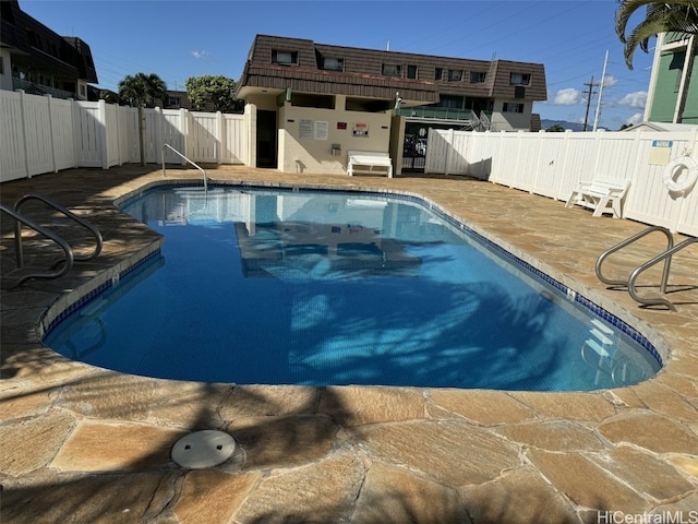 view of swimming pool featuring a patio