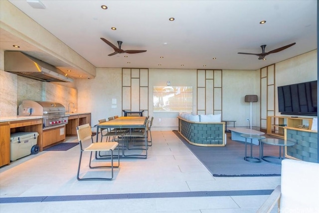 interior space with ceiling fan and light tile patterned floors