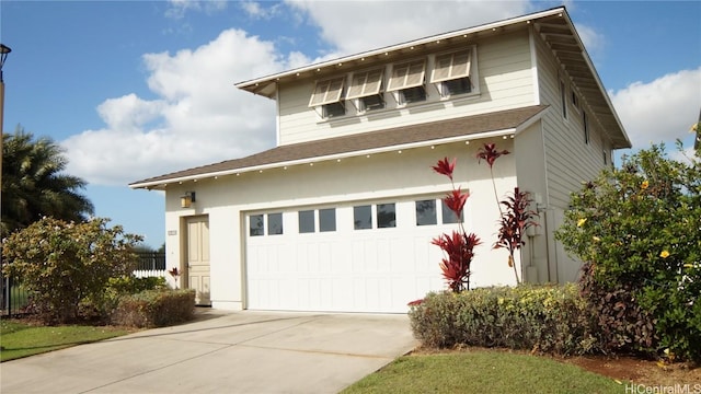 view of front of property featuring a garage