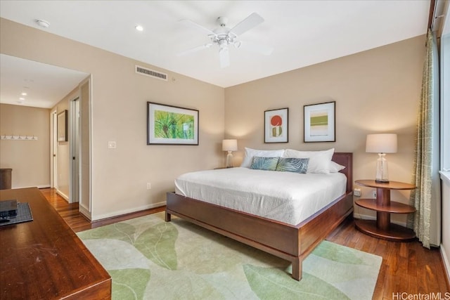 bedroom featuring ceiling fan and wood-type flooring