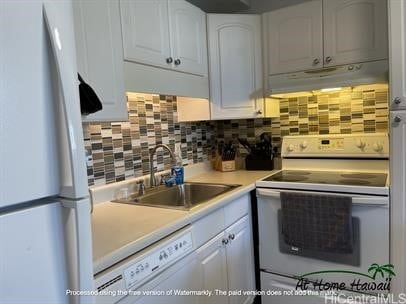 kitchen with white cabinets, white appliances, tasteful backsplash, and sink