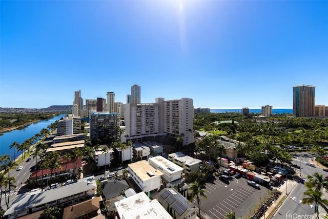 birds eye view of property with a water view