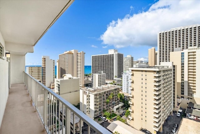 balcony featuring a water view