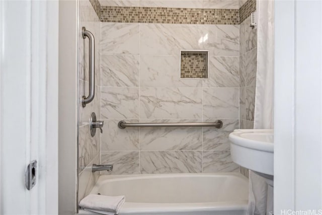 bathroom featuring shower / bathtub combination with curtain