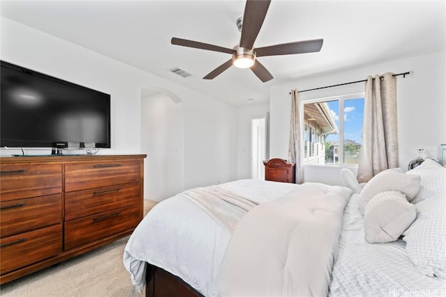 carpeted bedroom featuring ceiling fan