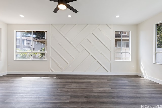 interior space featuring ceiling fan and dark hardwood / wood-style flooring