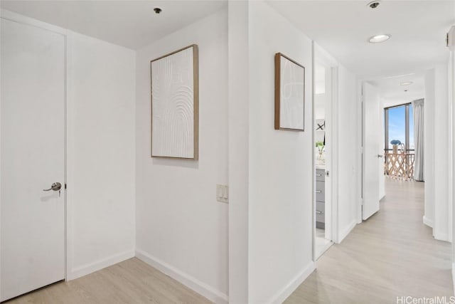 hallway featuring light wood-type flooring