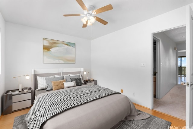 bedroom featuring ceiling fan and light hardwood / wood-style floors