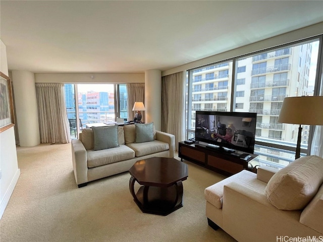 living room with light carpet and a wealth of natural light