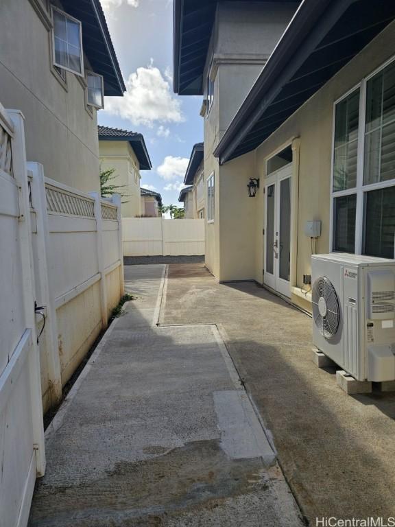 view of patio featuring ac unit and french doors