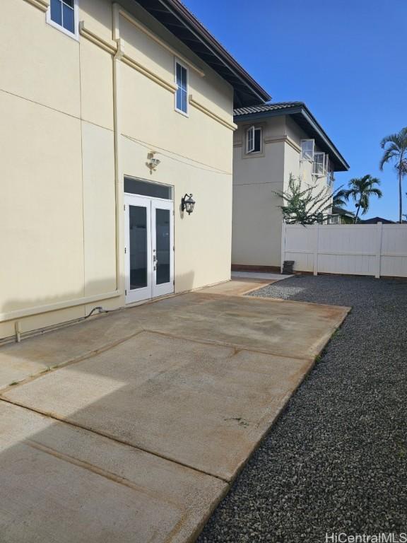 exterior space with french doors and a patio area