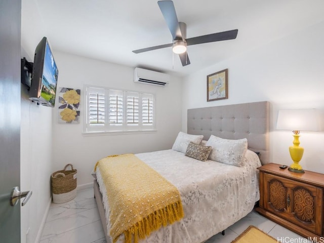 bedroom featuring an AC wall unit and ceiling fan