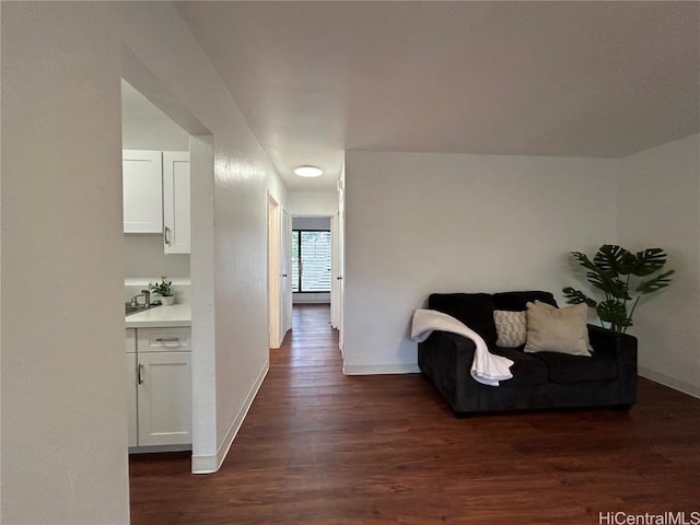 hallway featuring dark hardwood / wood-style flooring