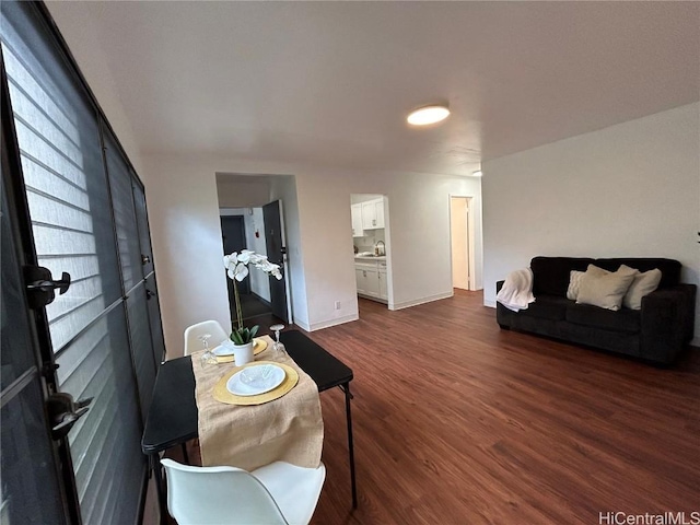 dining room featuring dark hardwood / wood-style flooring