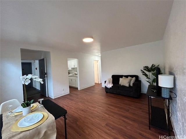 living room featuring dark hardwood / wood-style flooring