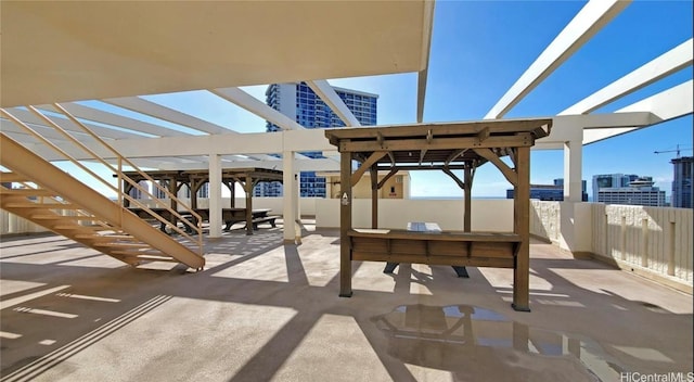 view of patio featuring a pergola