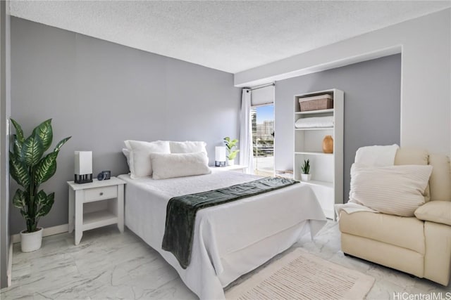 bedroom with a textured ceiling