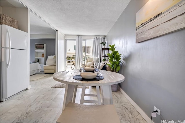 living room with a textured ceiling