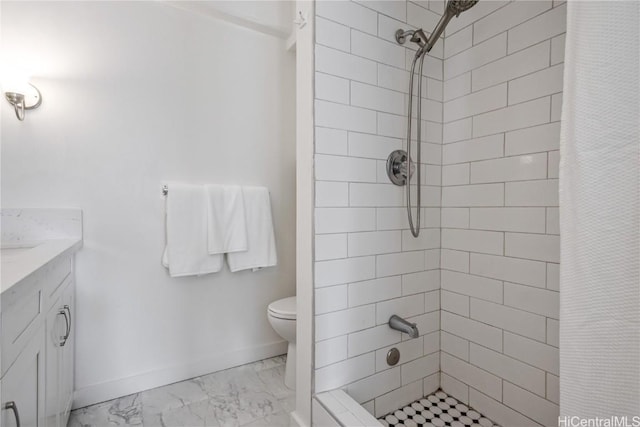 bathroom with toilet, vanity, and curtained shower