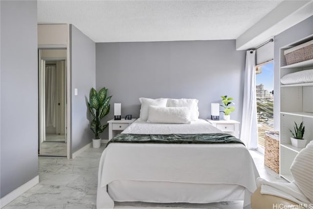 bedroom with a textured ceiling